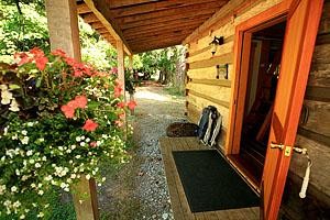 A Captain's Quarters Galiano's 1894 Heritage Log House Image