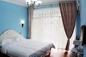Milan Kezhan Phoenix Hotel Image