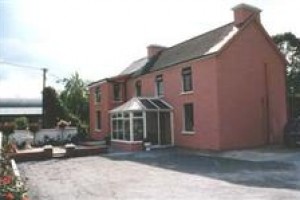 Palm Grove Farmhouse Image