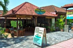 Temple Cafe & Seaside Cottages Image