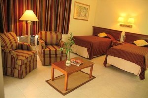 The Palm Garden Hotel Image