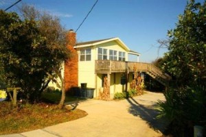 Turtle Nest Realty Quest Hotel Image